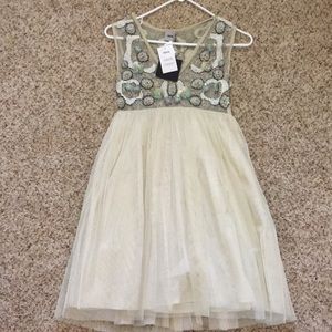 Bead and tool ASOS dress new with tags. Never worn